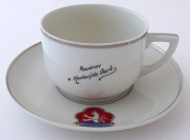 Cup with a saucer and the emblem of the city of Karlsbad